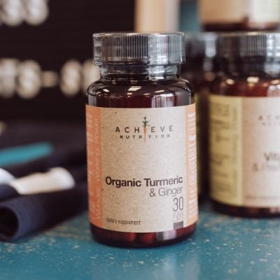Bottle of Achieve Wellness Organic Tumeric & Ginger
